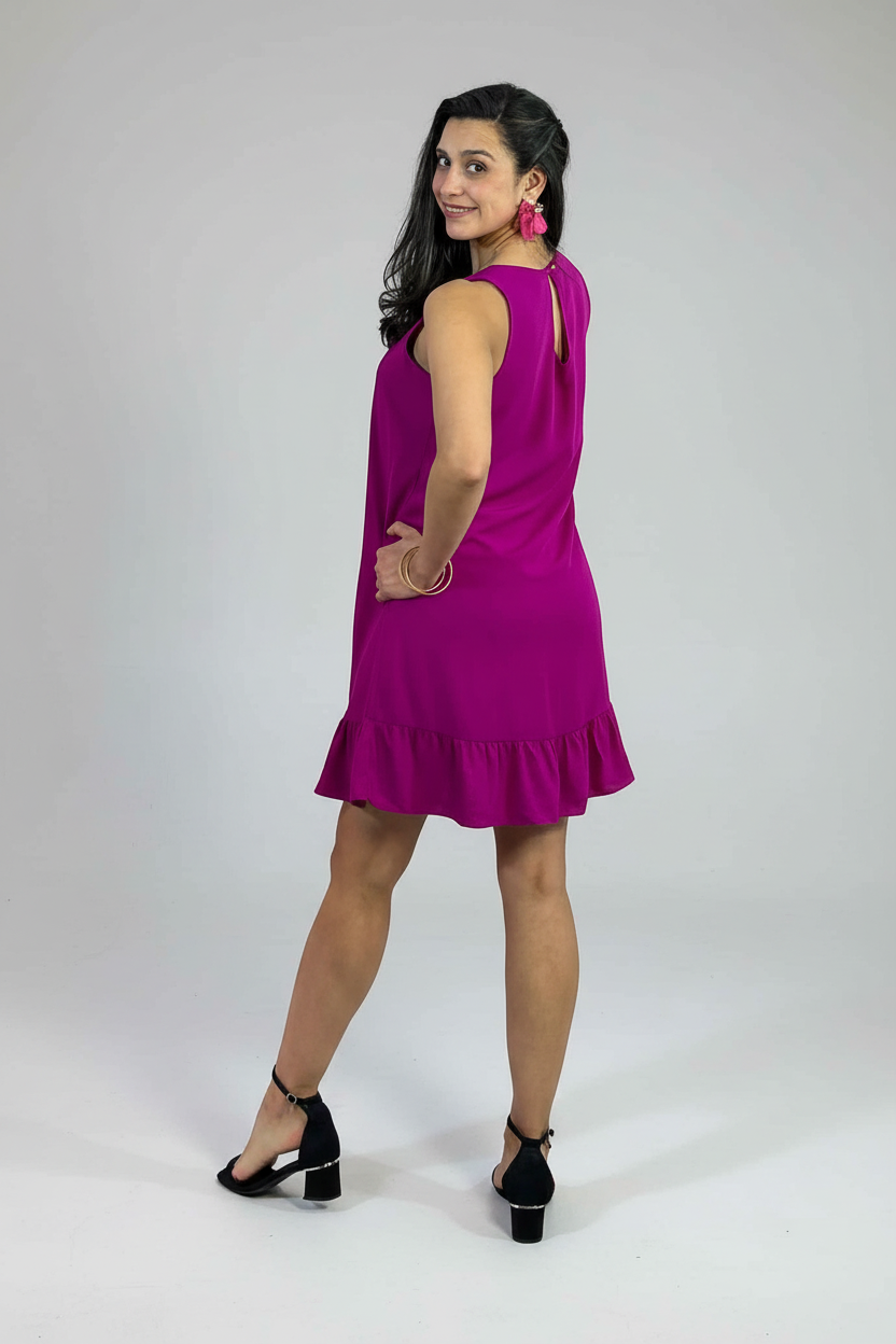 Vestido fucsia trasera fondo estudio